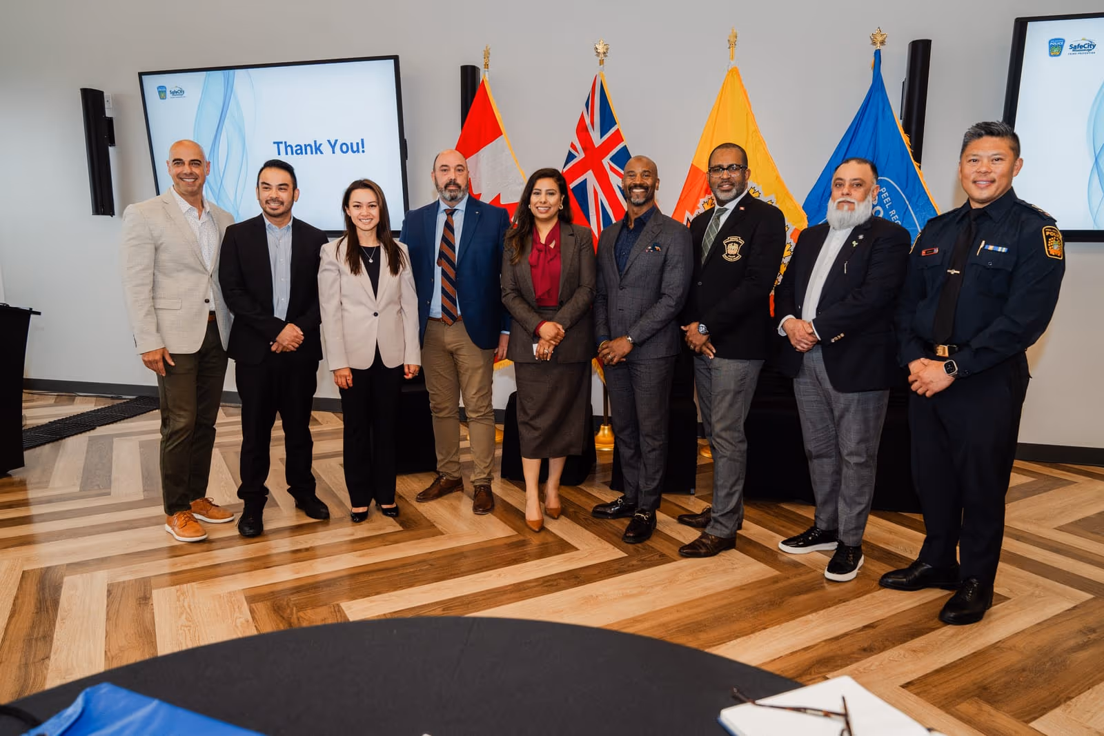 Gerald Adad with community leaders and police